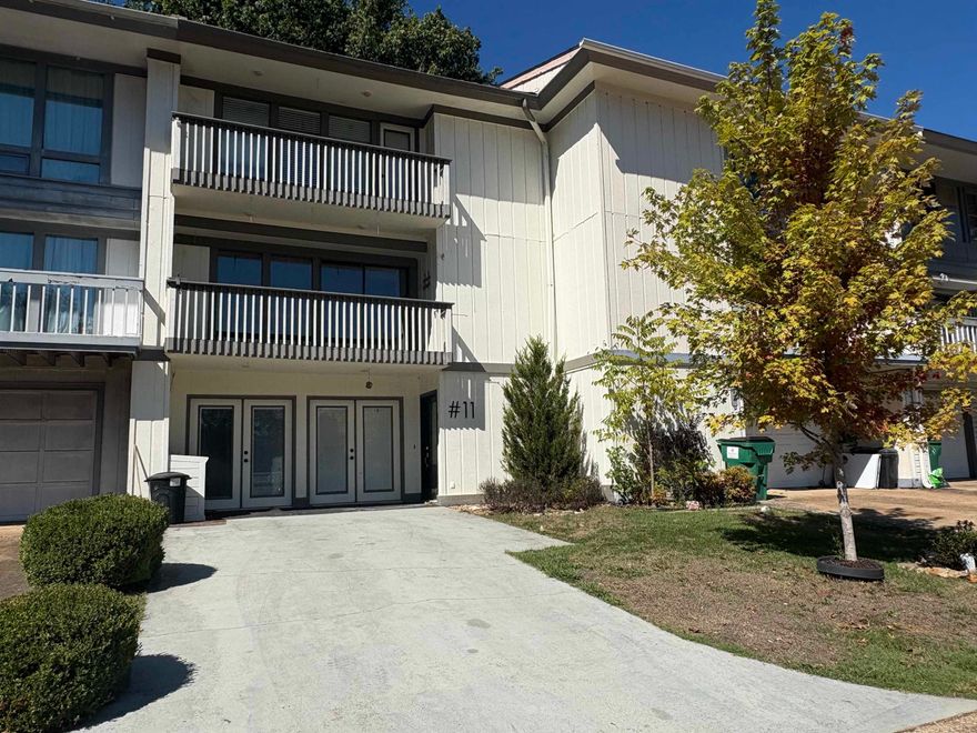 This one-of-a-kind, 3-level townhome offers versatile living with a handicap-accessible studio apartment or in-law quarters on the main walk-in level. The apartment includes a full kitchen, cozy living room with an elegant electric fireplace, and a spacious bathroom with a walk-in shower. Upon entering the foyer, you can either step into the studio or head upstairs to the main living quarters. The second level features an open-concept design, filled with natural light from large windows on both sides, creating a bright, inviting atmosphere. The living room, dining area, kitchen, and half bath are perfect for entertaining, with stunning year-round views from the balcony. The back deck leads directly to the community’s indoor pool, making relaxation easy. The top level includes 3 bedrooms and 2 baths, with the primary suite featuring a private balcony, adding to the home's charm. Whether you're looking for additional rental income or comfortable in-law accommodations, this home is an incredible opportunity!