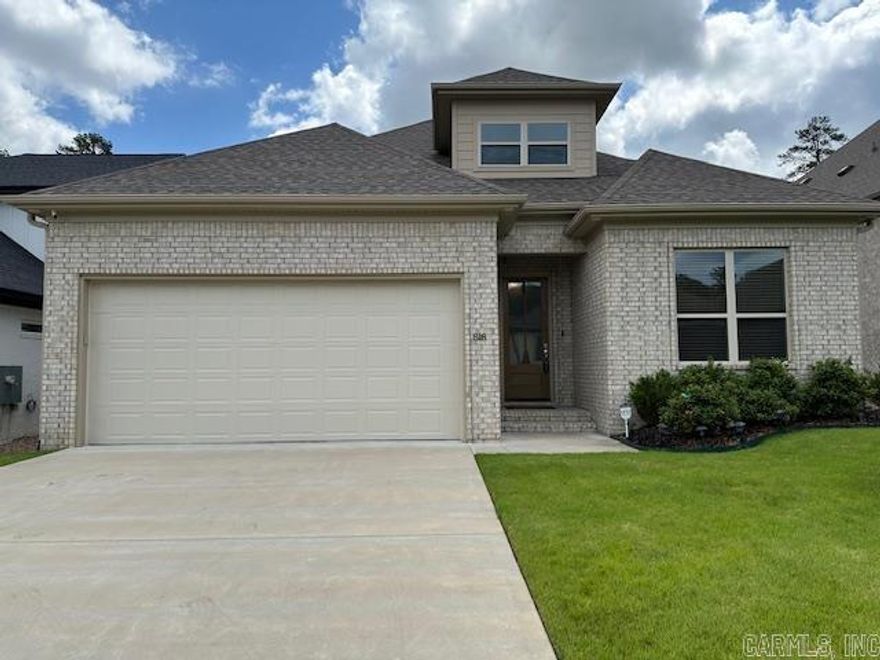 Immaculately maintained and ready for immediate occupancy, this single-owner residence is nestled in the sought-after Wildwood Place community in West Little Rock. Upon entry, the charming covered porch welcomes you, leading seamlessly into the expansive open floor plan adorned with luxurious vinyl flooring. The main level boasts a formal dining area upon entering, complemented by the convenient butler's pantry. The well-appointed kitchen features quartz countertops, stainless steel appliances, gas stove, and pantry. It flows effortlessly into the generously sized living area adorned with a gas log fireplace. The private primary suite is a retreat with double vanities, soaker tub, separate shower, and spacious walk-in closet. The main floor private guest bedroom has access to a full bath. The laundry room, complete with storage, adds to the functional design. Ascending upstairs reveals two additional bedrooms with a shared bath and convenient walk-in attic storage. Step outside to the covered patio and enjoy the serene backyard, backing onto protected green space—a delightful connection with nature. The subdivision offers amenities such as neighborhood pool, picnic areas, and more.