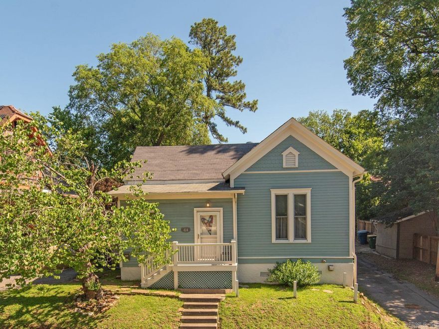 Welcome to 414 W 16th St, nestled in the Historic Quapaw Quarter of Little Rock! This charming residence, built in 1886, seamlessly combines history with a modern luxury. This updated 1 bedroom, 1.5 bath home (with the potential for a second bedroom) spans 1,073 sq ft. Step inside to discover stunning hardwood flooring, intricate crown molding, and a thoughtfully designed layout that provides both privacy and an inviting flow. The front room, currently serving as an office, can easily be transformed back into an additional cozy bedroom. The primary bedroom features leaded glass windows, retrofitted to bathe the room in natural light. You'll even find an original clawfoot tub in the main bathroom! Custom woodwork in the kitchen with an added storage loft, providing both functionality and style. The home’s backyard is truly impressive, with a fully-fenced backyard that features a raised deck, a charming fiberglass in-ground pool, and a cozy fire pit, perfect for entertaining or relaxing in your private oasis. Major updates done within the last 10 years, don't miss this chance at a stunning home downtown!