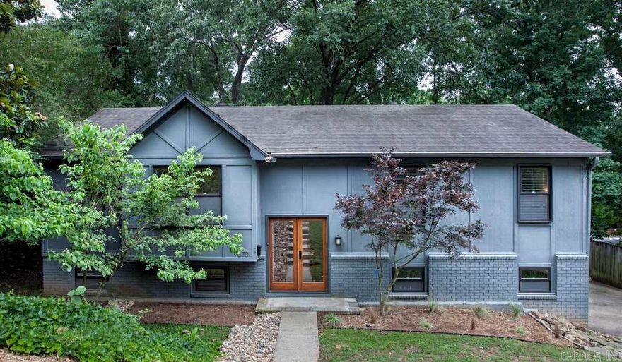 WOW! Beautifully redesigned home by local architect. Open floor plan flows into multiple areas- formal living, drining, kitchen and hearth room. Breath taking kitchen has leather textured granite counter tops, glass front cabinets, SS appliances, huge central island w/pendant lighting. Master suite is a modern work of art. Guest room and bath complete main floor, 2 beds, full bath, game room, wet bar and laundry on 2nd level. Great attention to design and detail at every turn. See online documents & remark.