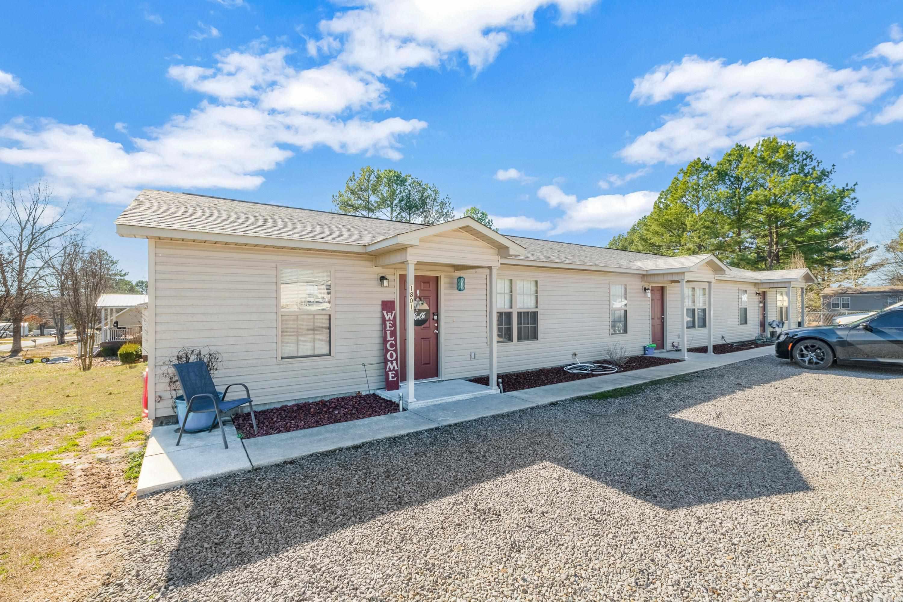 ATTENTION Real Estate Investors & Multi-Family Property Hunters! We're excited to present an opportunity to acquire a diverse package of multi-family properties in NE Central Arkansas! This is 1 of 2 sets of triplexes that sit across a large parking lot facing each other. These triplexes are part of a larger package that also includes 3 sets of duplexes and a 1.5 acre lot with highway frontage. Total package is 2 triplexes, 3 duplexes and a 1.5 acre lot. THE TRIPLEXES AND DUPLEXES ARE ALL TURNKEY! Come take a look today! Agents, please see Showing Remarks AND Agent Remarks. See MLS #s: 24003478, 24003480, 24003481, 24003482, 24003484  **SOLD AS PACKAGE** 1801, 1803, 1805 Forey St. Judsonia, AR 72081 1821, 1823, 1825 Forey St. Judsonia, AR 72081 901, 903 Paul St. Bald Knob, AR 72010 714, 716 Forbes Dr. Bald Knob, AR 72010 718, 720 Forbes Dr. Bald Knob, AR 72010 367 N 323 Highway Judsonia, AR 72081