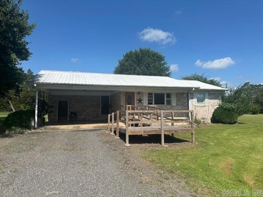Looking for something in the country? Here you go!! This 3 bedroom 2 bath brick home sits on approx. 3.19 acres and is conveniently located near Lonoke, Cabot & Beebe. The home features a desirable split floor plan, a kitchen with plenty of cabinet space and a breakfast bar for casual dining. Outside, you'll find a 30x40 shop with electricity ~ perfect for projects or extra storage. Enjoy your morning coffee on the covered patio while taking in the peaceful country views.   Sq. Ft. is approx. measuring is encouraged. Dog kennel & storage container DO NOT CONVEY
