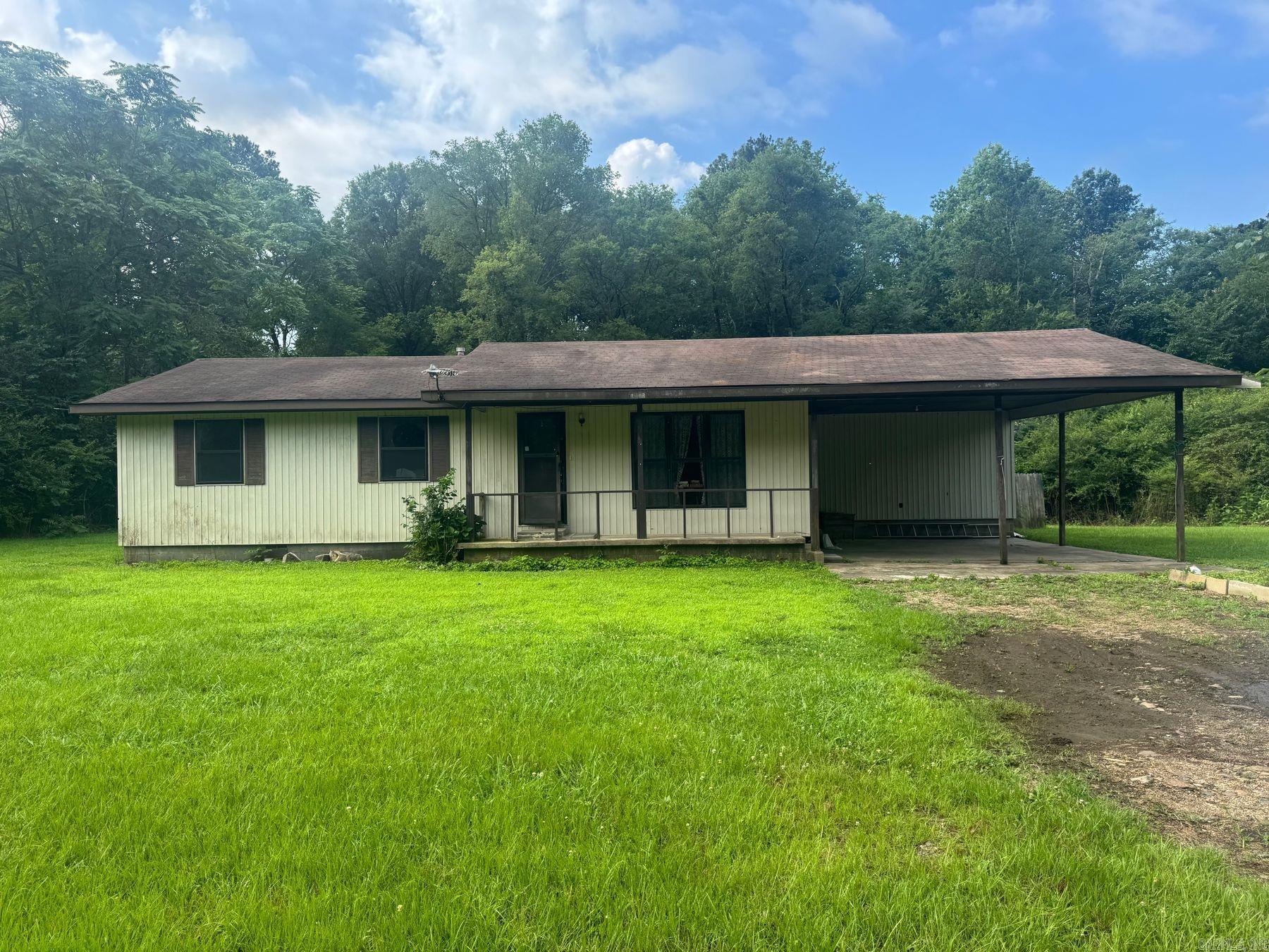 Fixer-Upper in Mountain Pine School District This 3-bedroom, 1-bath home, approximately 1,092 sq. ft., is a fantastic investment opportunity for those ready to roll up their sleeves and bring their vision to life. Nestled on a spacious 0.41-acre lot, this property features a double carport and offers plenty of potential for customization and improvement. This fixer-upper is perfect for investors or a buyer looking for a project to flip, rent, or create their dream home, this property is a blank canvas waiting for your personal touch. Key Features: ⢠3 Bedrooms ⢠1 Bathroom ⢠Approx. 1,092 sq. ft. ⢠Double Carport ⢠0.41 Acre Lot This property is available for purchase with cash or a construction loan. Don't miss out on this incredible opportunity to invest in a promising area. Schedule your viewing today and start planning your renovation!