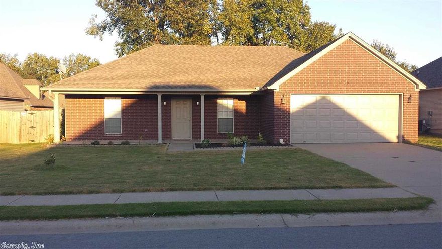 ***MOTIVATED SELLER***MOVE IN READY***Spectacular 3 bedroom 2 bath home located in the Bryant School District. Large great room opens to the kitchen/dining area. New wood flooring in living room and hall area, tile in all the wet areas. All rooms are spacious, split bedroom plan and this home is immaculate. Quiet setting, excellent family neighborhood, maintenance free exterior, nice fully fenced back yard with private patio. This is one of the nicest homes in the neighborhood.