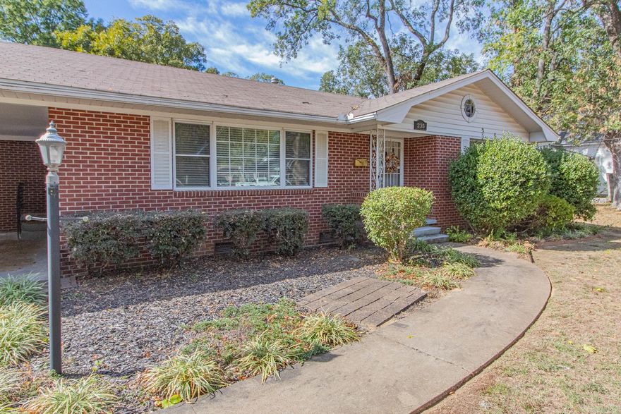 This charming home is in the heart of Old Town Conway within a stones throw of Central Baptist College and just blocks away from UCA. You can feel the love in this home immediately upon stepping inside. We all get excited when we see the beautiful, thin plank hardwood flooring in the large formal living room. This common 1960's floor plan showcases a combination formal living room and formal dining room with a large "picture window". You'll find a gas log fireplace to cozy up to no matter how you choose to use this room. The kitchen has a second eating area too. There is a surprisingly large laundry room which offers enough space for a desk/home office area. The den can function as the third bedroom with it's on closet and quaint built-ins unlike those in modern homes. French doors lead from the den into a large screened in back porch to be enjoyed throughout the year but especially now since Fall is finally here.  If you're not yet sold on this property, then you need to come see the beautiful backyard with huge pecan trees and other seasonal flowering trees and shrubs. Roof 2013 WH 2017. Storage Shed, Washing Machine and Refrigerator to convey.