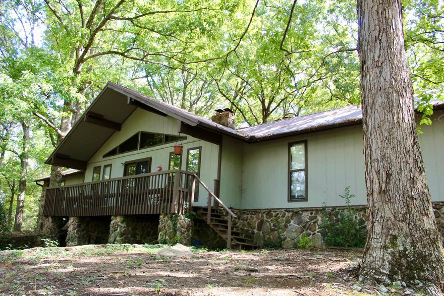 Escape the hustle and bustle of city life by stepping into this enchanting home that seems lifted straight from the pages of a fairytale. Perched on a gentle hill, this residence offers a commanding view of its surroundings, ensuring a sense of privacy and seclusion despite its location within a friendly subdivision. As you cross the threshold, the interior welcomes you with a palette of fresh grey walls, illuminated by an abundance of natural light.. The heart of this home is undoubtedly the brick fireplace that stretches from the first floor to the basement, adding a touch of rustic charm to the modern and updated design. This fairy-tale home is thoughtfully laid out with two bedrooms nestled upstairs, offering serene spaces for rest and rejuvenation. Meanwhile, the basement houses an additional bedroom and a versatile bonus room, perfect for a home office, gym, or den, along with direct access to the yard from both levels. This enchanting home is move-in ready, beckoning you to start your next chapter in a place where every day feels like an escape to a storybook setting. Let's discover this magical abode today and turn the page to your new beginning!