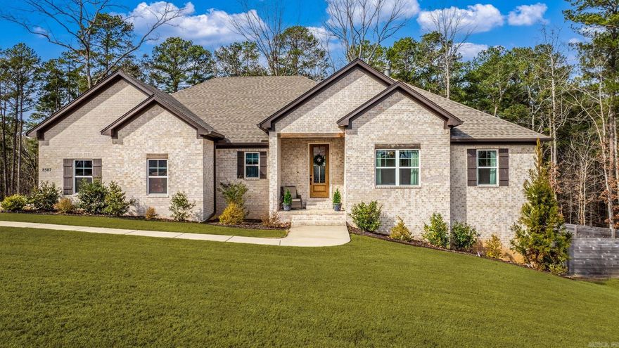 This Tucker’s Hill home has it all! 1.2 acres of cleared and wooded land, a dream backyard with sparkling pool, plus a gorgeous home with lots of space and upgrades! The open living, dining and kitchen is perfect for entertaining. You’ll love the woodburning fireplace and built-ins, huge kitchen island, and butler’s pantry. The upgraded Café appliances add a luxury touch, and the matching refrigerator conveys. The private primary suite is a true retreat with high ceilings, soaking tub, walk-in shower, and an oversized closet that connects directly to the laundry room. A convenient half bath and mudroom sit just off the garage, while three additional bedrooms and a full bath are thoughtfully positioned on the opposite side of the home. Downstairs, you’ll find a second living area, full bath, large walk-in closet, and an additional bedroom…perfect for guests or multi-generational living. Step outside to your backyard oasis complete with a gorgeous in-ground Gunite saltwater pool featuring a sundeck, wall seating, stone accents, and expansive patio space. There are even raised garden beds (with veggies growing)! This property truly has it all, so don’t miss it! Agents see remarks.