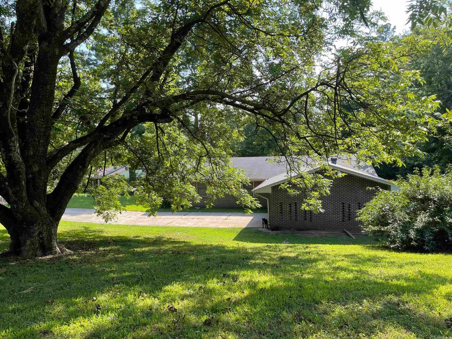 Experience the ultimate in convenience with this three bedroom, two bath home situated on a corner lot in a prime, established neighborhood. Enjoy the ease of access to all amenities and services located at the center of everything.