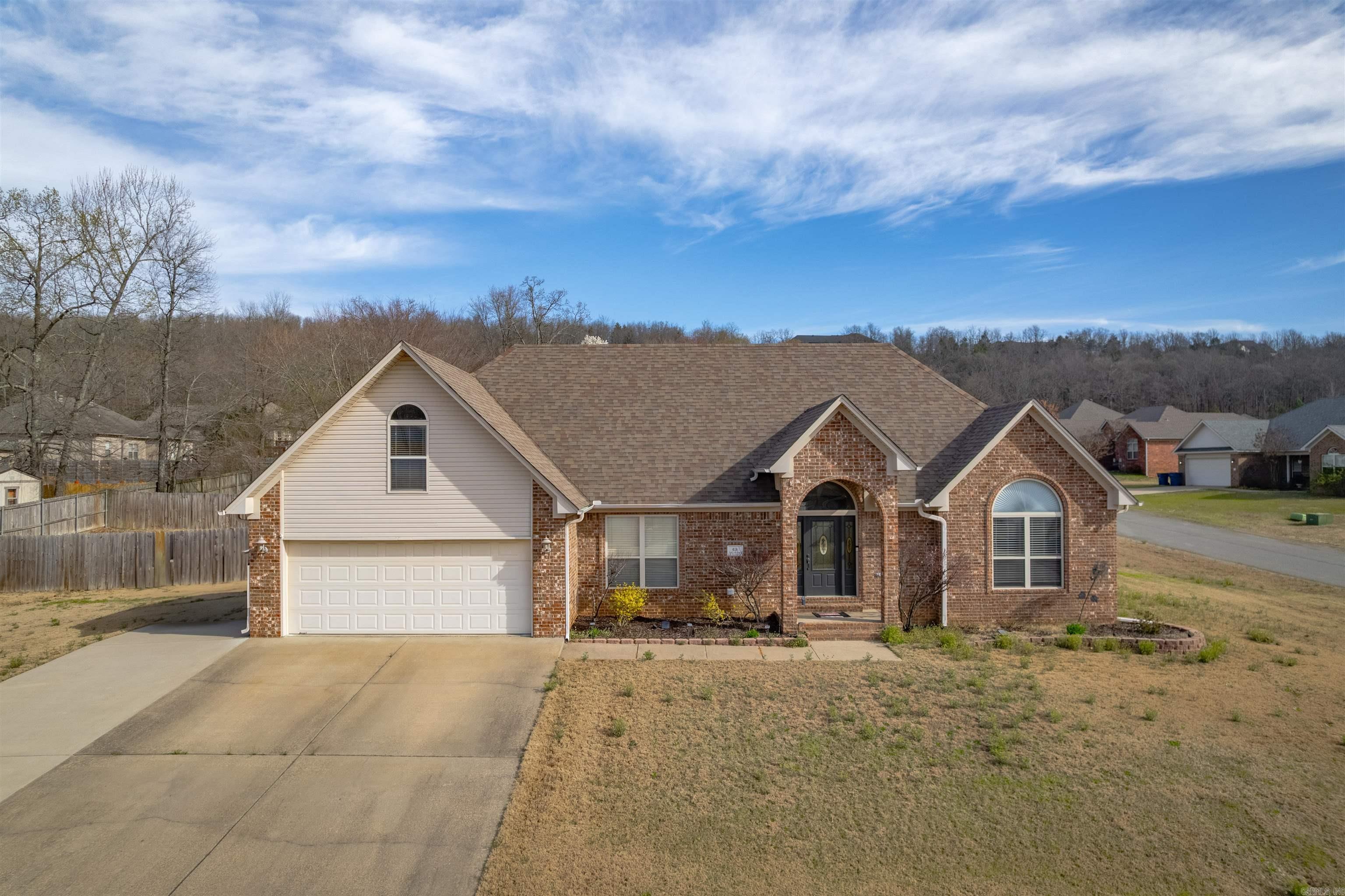Welcome to Magness Creek! This 3-Bed & 2-Bath downstairs + 1-Bed upstairs home is located in the center of Magness Creek North. In fact, just across the street from the point both Sunrise & Sunset Lakes meet w/a fantastic bridge area to watch the Sunsets on evening walks, fishing pier, & a covered awning + 1/2 Court Basketball Court too! But, we can discuss the area amenities later. This home is situated on a corner lot w/a full 3rd parking space & fully fenced backyard. Entering the home one notices the large foyer w/decorative file flooring & the living room w/tray ceilings ahead. Home is open concept w/Kitchen that boasts a barrel rolled ceiling overlooking the living room & dining room is off kitchen facing the road & driveway. Master Bed & Bath is on the left + Laundry too creating a split floorplan layout w/Guest bedrooms & bath on the right. The home has LVP & Tile downstairs and Carpet upstairs. Take a minute to come tour this home. Standy for updated pics shortly! See Agents Remarks.