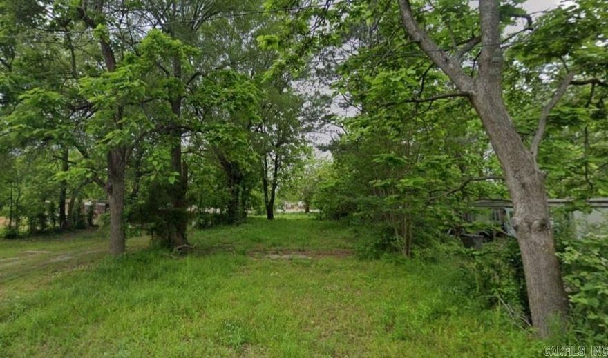 This is a .16 (+/-) acre lot in Paragould, Arkansas of Greene County. It is flat, and cleared with a few trees, minutes from local amenities and ready for you to build a home. Manufactured homes are allowed as well. Owner financing is available. Property conveys a Limited Warranty Deed. Call or text for more information.