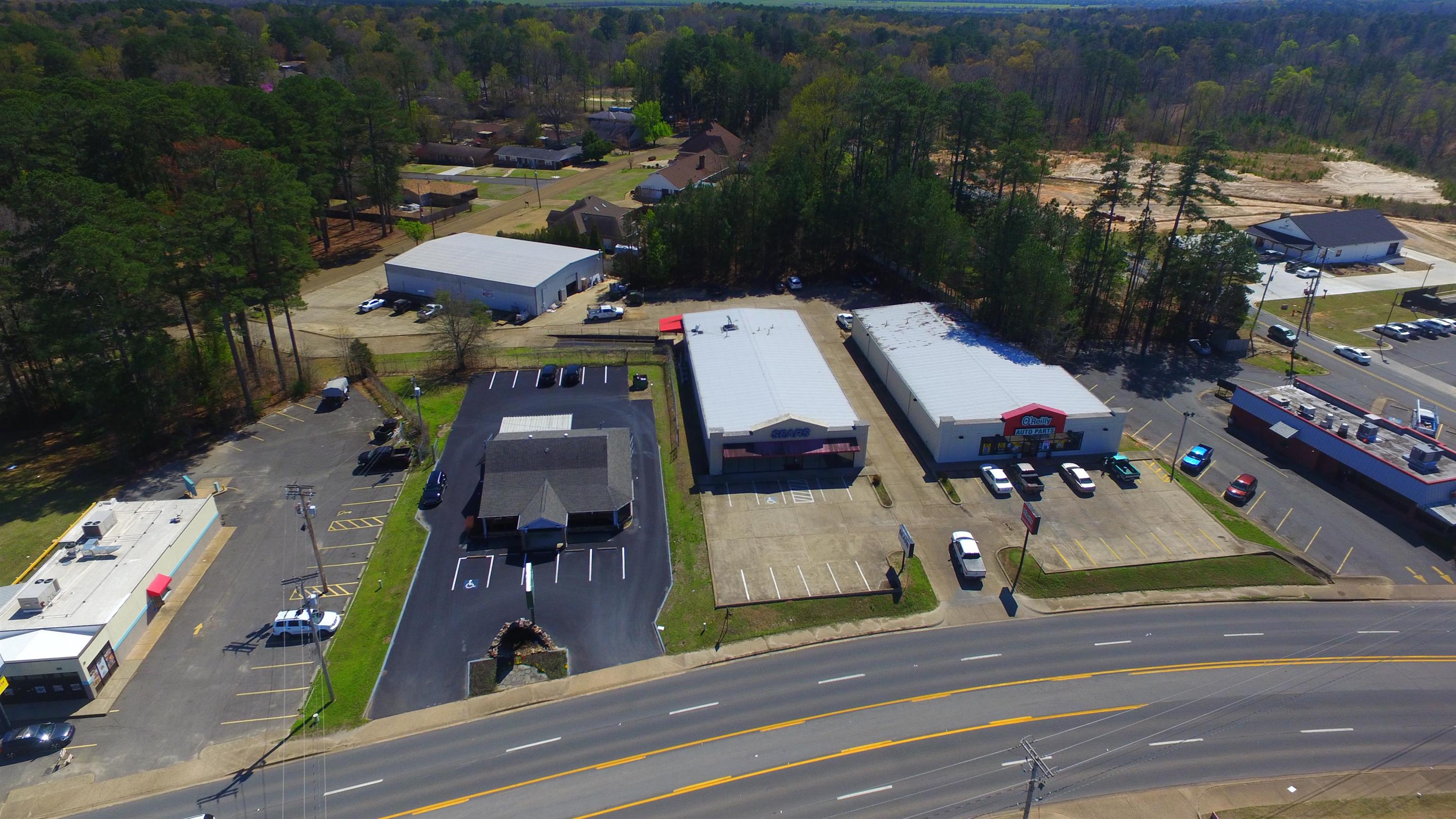 This is your chance to own a QUALITY BUILT Metal Insulated building approx. 7,168 Sq. Ft retail building located in the prime commercial location along Pine Street in Arkadelphia, Arkansas just past the NEW Bypass construction, Across from CHI St. Vincent, Bank of OKZ, Animal Clinic, Auto Sales, Autozone and next door to O'Reilly AutoParts! With frontage along Pine Street and along North 29th Street in the rear giving easy access to the large and small loading docks. Rear Parking and front parking access with appox 28 spaces total. Guttering, newer ac units, floor to ceiling front glass entry for showcasing inventory, offices, restroom, secure storage area etc. If you are searching for a HIGHLY visible location for your retail, office, or light commercial location in Arkadelphia - Home to Ouachita Baptist University, Henderson State University, DeGray Lake, DeGray Lake State Park, Caddo River, and the Ouachita River! With over 18,000 average daily traffic count and near a major intersection with coming soon bypass intersection this makes for a great opportunity for just about any type of business! Property is also available for lease - Contact listing agent for more details