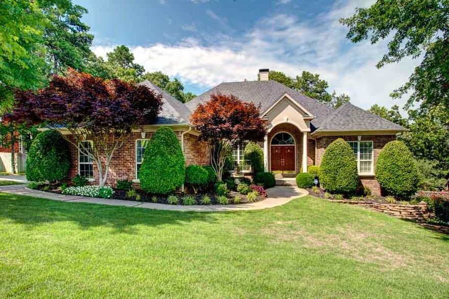 PRISTINE ONE LEVEL! 3 car sideload garage (step free),2 living areas, 2 fireplaces! Beautiful hardwoods! Sunroom, private office, formal dining & living area. Large kitchen opens into a breakfast area overlooking landscaped grounds, sunroom & family living area w/ large custom built entertainment center. 4 brms, 3 full ba & 1/2. Master w/tray ceiling, large master bath w/sit down vanity, LARGE closet. Detailed trim, molding. On over 1/4 acre, custom built, one owner home in immaculate condition! Rare find !