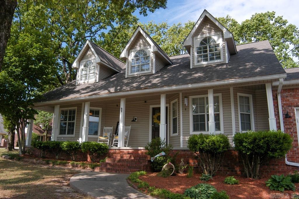 This spacious 3-bedroom, 3-bath home in North Little Rock's sought-after Windsor Valley Addition offers 2,468 square feet of beautifully updated living space with traditional charm throughout. Inside, youāll find a large living area with a cozy gas fireplace, a formal dining room flooded with natural light, and a chefās kitchen featuring custom cabinetry, granite countertops, and a butcher block islandāperfect for meal prep or casual dining. The downstairs primary suite is a true retreat with private access to the back deck, a luxurious jetted tub, custom tile shower, and a generous walk-in closet. Upstairs, a large bonus room with its own full bath offers endless potentialāguest suite, game room, home office, or additional bedroom. Additional highlights include a 2-car attached garage, a laundry closet conveniently tucked between the kitchen and primary suite, and immaculately maintained landscaping. The backyard is fully fenced with a brand-new 4-foot wooden fenceāideal for pets or outdoor entertaining. Peace of mind comes with a brand-new roof (Summer 2024) and regularly serviced HVAC units (upstairs 2015, downstairs 2013). This move-in ready home is the perfect blend of fun