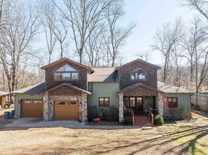 Spectacular craftsman style home located on one of the best sections of the Little Red River.  On deep water just below the Jon's Pocket shoal system.  Native cedar interior and loads of artistic and architectural features.  Great outdoor spaces, outdoor kitchen, fire pit and a big screened porch accessible from the primary bedroom suite.  Easy access to the dock with power lift that will accomodate a 20' trout boat.  Dual zone HVAC, on demand water heater and utility garage with door opening to river side for easy access to sports equipment or use as a play/bunk room, etc.  This beautiful, unique river property is the ultimate "fishing cabin" on some of the best trout waters in North America.  Minutes from shopping, health care and services in Heber Springs and Greers Ferry Lake.  NOTE: photos showing the Little Red River were taken on a day of extraordinarily high flow.