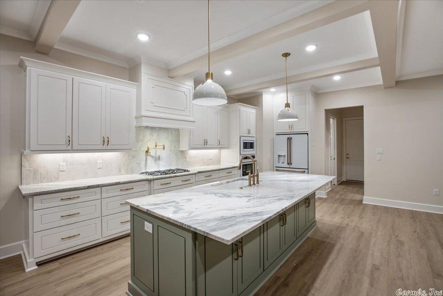 Brand new Graham Smith Construction home in West Little Rock! This beautifully designer-selected build is under construction and ready to see! This home features two levels, shown off by an extra tall foyer. With four bedrooms (2 down, 2 up), and a large bonus room upstairs, this new home has space for everyone! The private master suite backs to trees, and includes an extra large walk in closet. Designs included for reference - some items subject to change based on material availability.