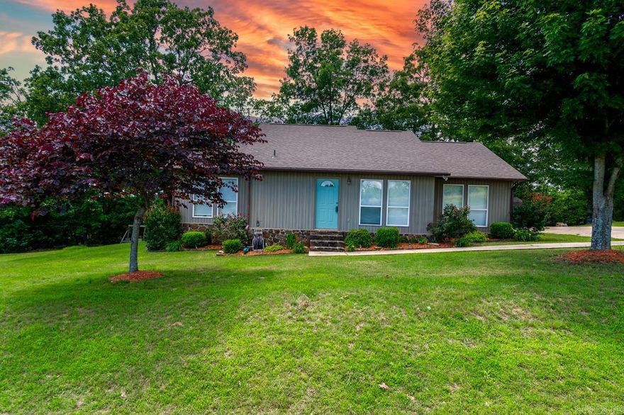 Enjoy year-round views of Greers Ferry Lake from this 3-bedroom, 1-bath home situated just ¾ mile from the boat launch and marina! Built in 2004, this 1,367 sqft traditional home sits on 1.25 acres and features a large back deck—the perfect spot for relaxing and taking in the scenery.  Inside, the home offers tile flooring throughout the living areas, kitchen, and bathroom, with cozy carpeted bedrooms. The centrally located bathroom provides easy access from all bedrooms.  The paved driveway offers plenty of parking, including space for a boat. Outside, beautiful landscaping with flowerbeds and ornamental trees adds charm to the property. A storage building conveys with the sale, providing extra space for lake gear and tools.  Whether you're looking for a full-time residence or a weekend getaway, this home is a fantastic opportunity to enjoy lakeside living with convenience and comfort. Don't miss out—schedule your showing today!