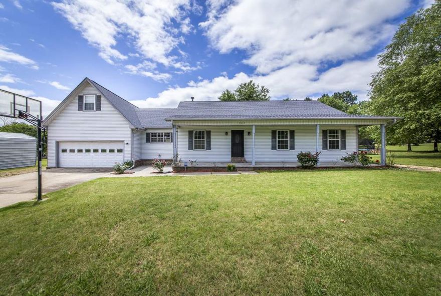 This beautiful remodeled ranch style home has 4 bedrooms 2 baths with a large bonus room over the garage. BRAND NEW FLOORS and fresh paint throughout. Walk in pantry. Plenty of storage cabinets. All of the bedrooms have BRAND NEW CARPETS. NEW ROOF, NEW HVAC, NEW TANKLESS WATER HEATER. Above ground pool attached to freshly stained deck. 20x40 shop. Fully fenced in back-yard. Large storage room attached to the back of the oversized garage. Schedule your showing ASAP! This one will not last long!