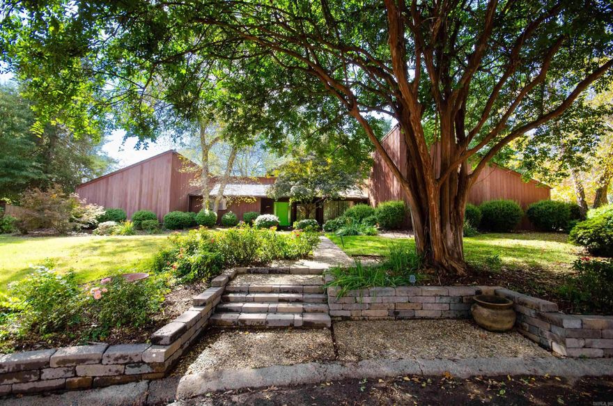 Tucked into a quiet cul-de-sac in the highly sought-after Jefferson Place neighborhood in Conway, this one-of-a-kind home blends modern design with timeless charm. Surrounded by mature trees that offer both beauty and privacy, the setting feels peaceful and established while still being close to everything.  Inside, you’ll find a unique layout with stylish, contemporary finishes that make the home truly stand out. Natural light pours in, highlighting the thoughtful design and inviting spaces throughout. Step outside to a spacious backyard, perfect for relaxing, entertaining, or simply enjoying the serene surroundings.  Homes like this don’t come around often—this is one you truly have to see in person to appreciate.  (MORE PHOTOS COMING THURSDAY APRIL 16, SHOWINGS CAN START ON WEDNESDAY, APRIL 15)