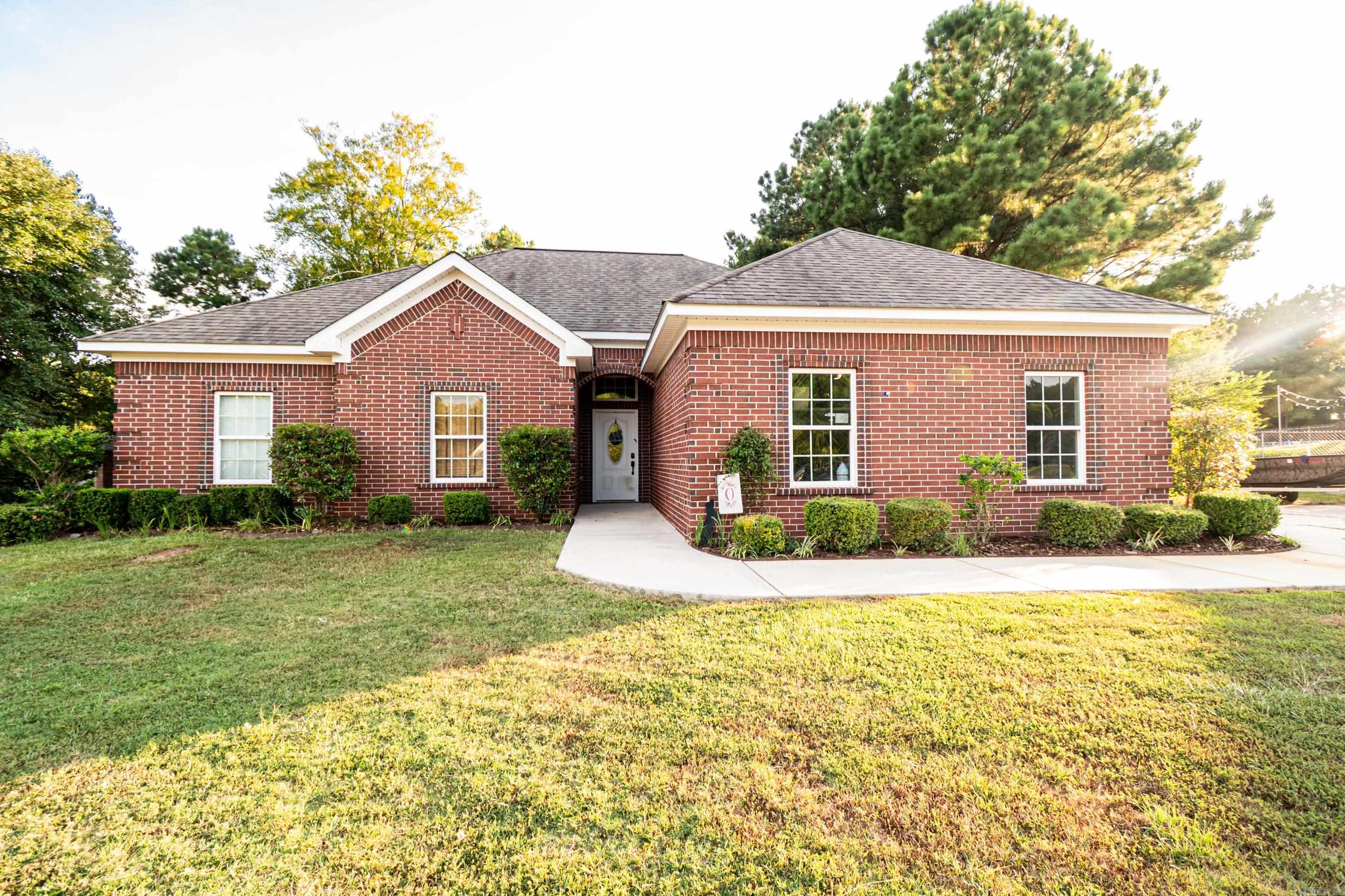 Welcome to 215 Hidden Hollows in The Hampton Hollows Subdivision! Built in 2015, this charming 3-bedroom, 2-bath home offers over 1,500 sq. ft of open-concept living, perfect for both relaxing and entertaining. Situated on nearly three- quarters of an acre (0.73), you'll enjoy plenty of outdoor room for gardening, play, or simply soaking in the peaceful surroundings. With its modern design and inviting layout, this home is ready for you to make it your own. Don't wait- your dream home is right here!