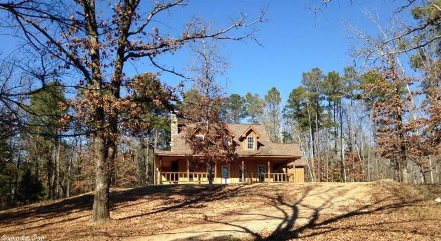 Beautiful, custom built home with 4 acres that includes a shop pad. This home creates a rustic resort type feel with the wood being from the property, fireplace, flagstone flooring, and so much more! There is a tankless water heater, insulated windows and doors, gas stove without a pilot light making home extremely energy efficient! A must see!