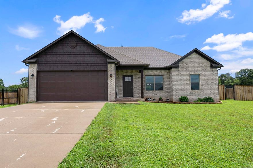 Welcome to this better than new home perfectly situated on a fully fenced acre, offering the ideal blend of comfort, privacy, and open space. Step inside to find gorgeous luxury vinyl plank flooring throughout, tall ceilings that create an airy, open feel, and a spacious layout that’s perfect for both everyday living and entertaining. The kitchen is a standout feature, showcasing beautiful granite countertops, stainless steel appliances, and plenty of cabinet space. The open floor plan flows seamlessly into the living and dining areas, making gatherings feel natural and inviting. Step out back to an added covered patio and extra concrete patio—perfect for enjoying quiet mornings, hosting summer cookouts, or simply relaxing while overlooking the expansive backyard. Whether you're looking for room to roam, space for pets, or a peaceful retreat, this home offers it all. A rare find with the charm of country living and the convenience of a modern home! See agent remarks