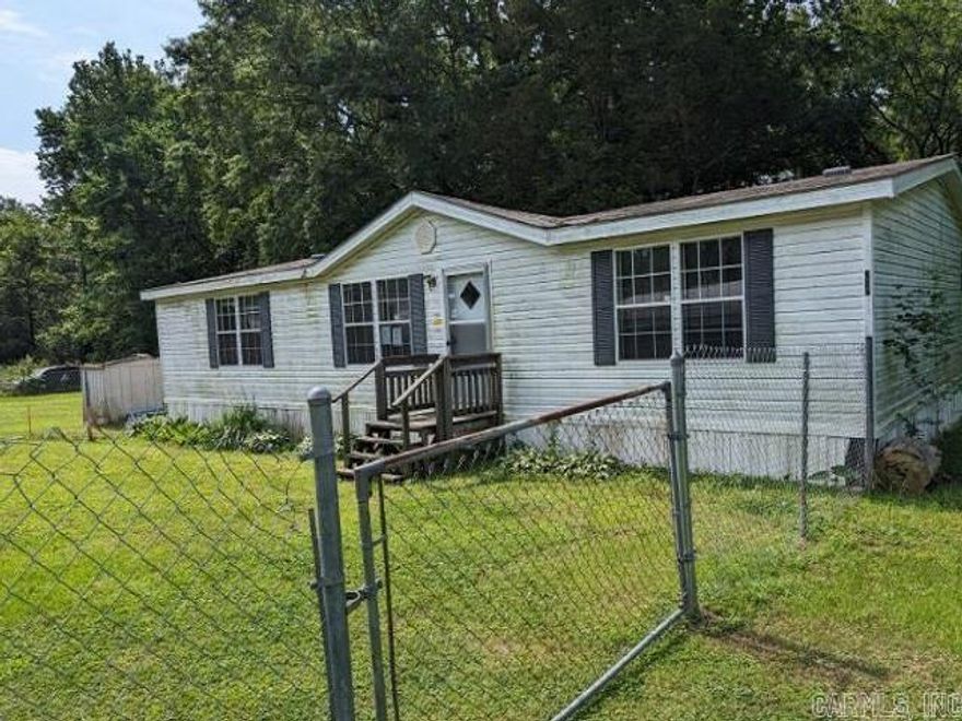This manufactured home has three bedrooms/two bathrooms on .10 acres and will need some work, including new roof, drywall and paint interior and flooring. CASH ONLY OFFERS, buyer responsible to ensure this Mobile Home/Manufactured Housing Unit has had the wheels, axles, and towing hitch removed, is on a permanent foundation or piers, and has been deemed permanently affixed to the subject property and a real property improvement, according to the requirements set forth by the Parish / County or Jurisdiction the subject property is located in, or obtain the vehicular title to the Mobile Home. Buyer to sign Hold Harmless and close AS IS. RESERVE AUCTION PROPERTY- Property sold “AS-IS” without contingencies, repairs, warranties, guarantees or representation as to listing accuracy, property information, photo or other depiction included or described herein. Inspect before bidding.