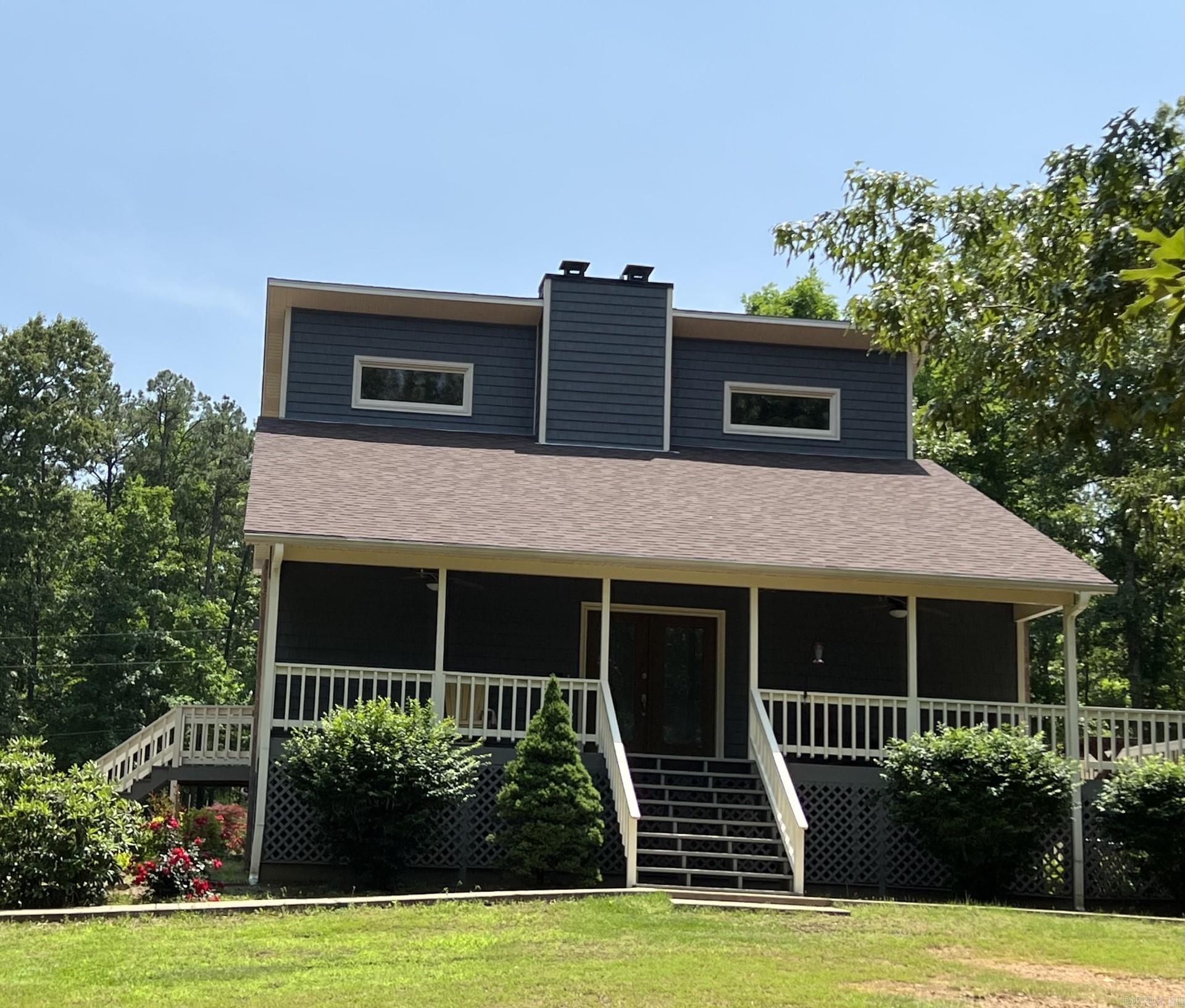Unique, one of a kind, custom built home resting on six wooded acres just minutes from Clinton. This two story home is masterfully designed for family gatherings and entertaining small groups. The home rests in the center of six wooded acres which provides a great buffer between neighbors' home. The upstairs features 2 large bedrooms, closets and a full bath. House has a full unfinished basement, but has a half bath and features solid concrete poured walls. Home also has a four car garage/shop area that is fully insulated and can be used by craftsman, mechanic, or a place for all toys. The property is centrally located and is in close proximity to many area attractions. The drive to City of Conway, home to three colleges, is approximately a 30 minute drive. Greers Ferry Lake is just minutes from the house. Home has area for gardening. Small and large containers, along with custom built raised beds. The house features two large deck areas that provide ample room for cookouts, larger gatherings, or hours of peace and solitude. Professional pictures coming soon. Agents see remarks.