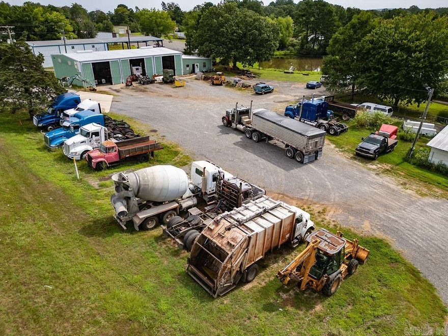 Incredible opportunity to own a turnkey commercial property with Hwy 65 frontage that’s been home to a successful semi-truck, trailer, and heavy equipment repair business for 44 years. This 4-bedroom, 3-bathroom home spans approximately 2,100 sq ft and comes partially furnished. It features a sunroom, fenced front and back yards, a storm shelter, and a stocked pond for added charm. The expansive shop is a mechanic’s dream, measuring 5,000 sq ft with a 50x100 parts room and office, plus two 30x30 outbuildings. Equipment included: 4x4 forklift, two welders, hydraulic press, drill press, brake inventory, drums, exhaust parts, welding table, oil tank, three battery chargers, waste oil burner, floor fan, turning lathe, glass bead blaster, water jet machine, large band saw, two swamp coolers, air compressors, and a high-pressure parts washer. This is a rare find for anyone looking to live and work on the same well-established property with endless potential.