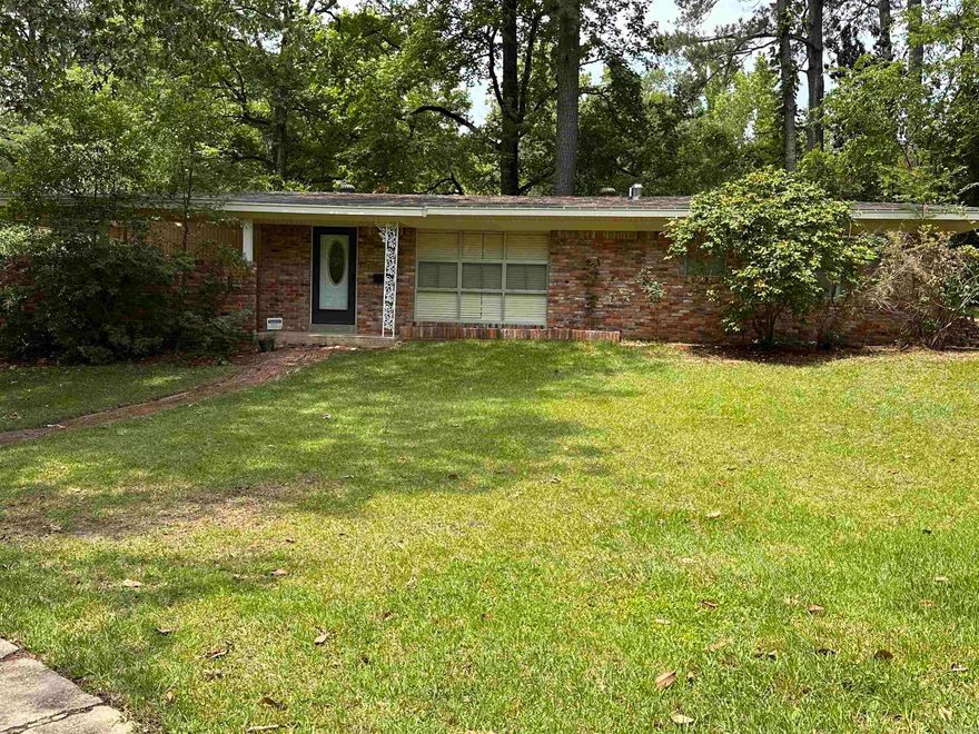 This cute home is located in a quiet well kept neighborhood. It would make great starter home or home for young family. Great investment property. New paint, new HVAC, remodeled kitchen with granite counter tops, stainless appliances, refrigerator stays breakfast bar, dining area, large family room. Large yard with patio, 2 car carport, 2 car garage with nice workshop.