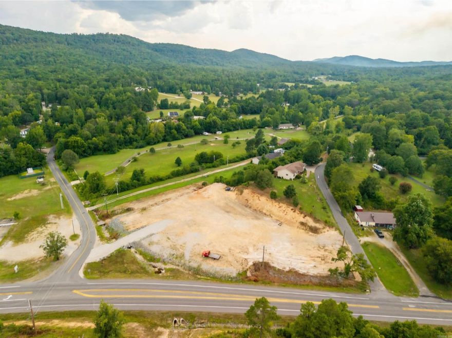 Excellentl Opportunity for approximately 2 acres on Highway 7 North- cleared, leveled and ready for your next commercial building project!  Features approximately 330 ft of Hwy 7 frontage plus additional paved access on two other streets, Walnut Valley Rd (193 ft ) and Jarrell Rd (110 ft ).  Utilities include North Garland County water, natural gas, existing septic, and electric at the street.  High Traffic location with estimated 10,000 +/- vehicles per day.  Less than 3 miles north of the new bypass roundabout and only 5 miles to Hot Springs Village. main entrance. Outside the city limits for added flexibility.  Owner/Agent