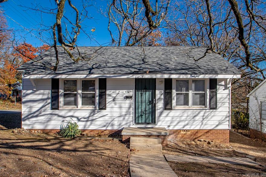 Live worry-free in this cute bungalow! EVERYTHING has been updated for you! Brand new roof and HVAC system. New Bathroom, kitchen counters, and refinished hardwoods. Both the interior and exterior have been freshly painted. Sitting on an over-sized corned lot, this home is just waiting for a new owner! Schedule your showing today.