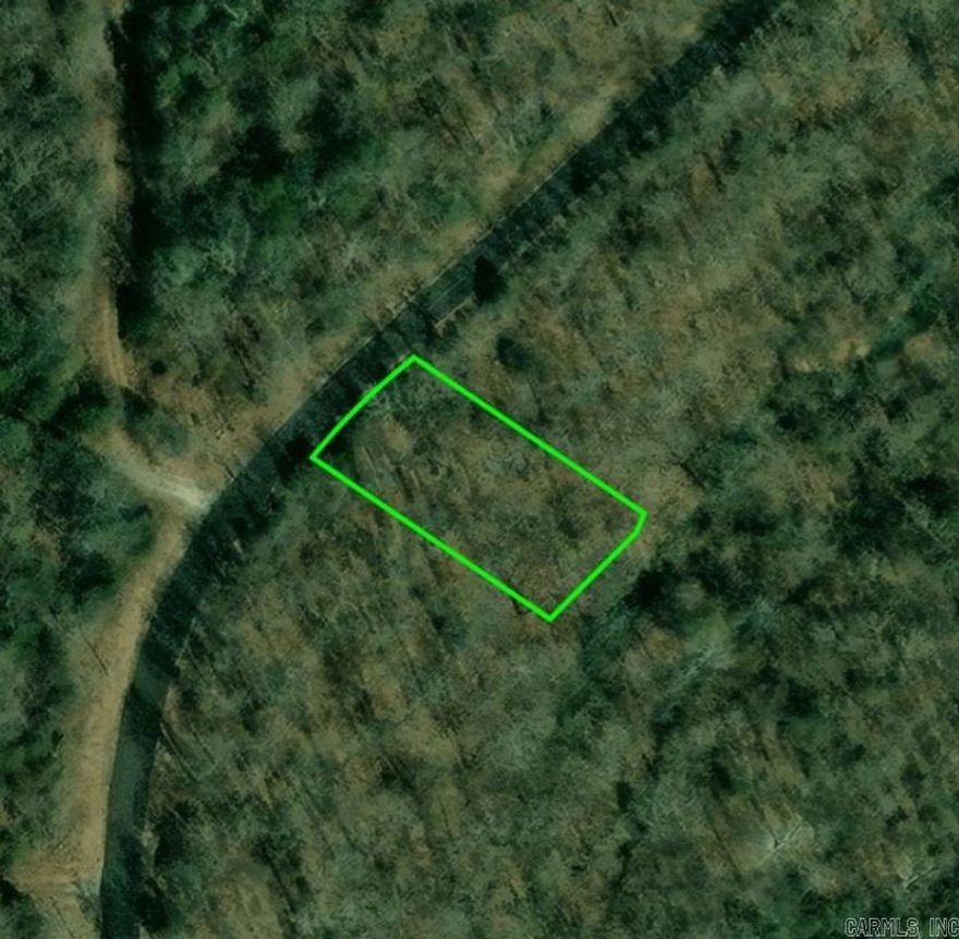Build a new home on this spacious .38 (+/-) acre lot. This area is quiet, by Ben's Creek, and only minutes from Crown and Diamond Lakes. No owner financing. Mobile homes are not allowed. Call or text today for more information.