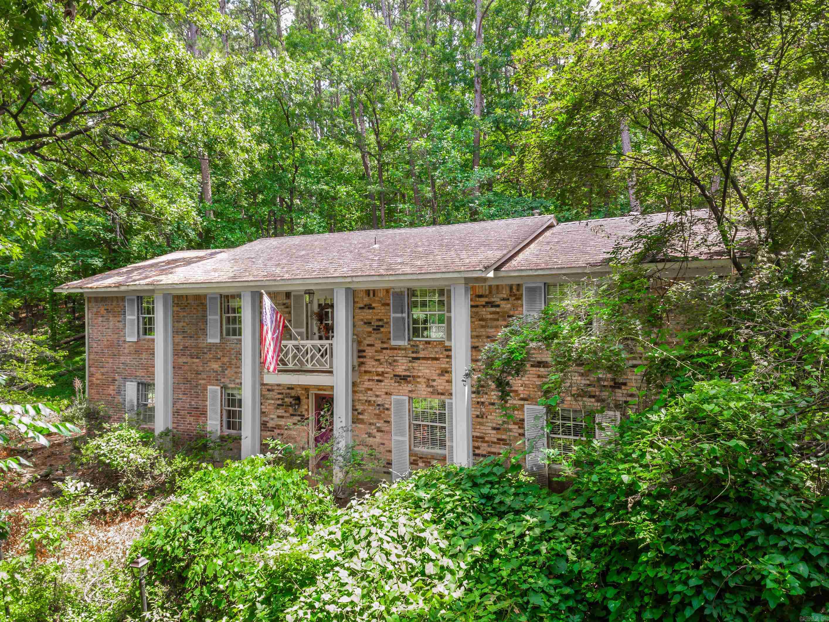 Come check out this 3294 sq ft 3 Bedroom 2 Bath that sits on 1.71 acres close to Beaverfork Lake. With some work & TLC you could make this home a showplace. The Living area upstairs has French doors that open up to a deck, separate dining room, large Primary bedroom has a HUGE walk in closet. The family room downstairs is large and has lots of built ins. There is so much space you really could renovate to your needs. The HVAC unit is only 6-8 years old. There is a storage Bld that could be a small work shop, Play house, man cave or she shed. Agents please see remarks !