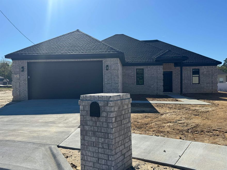 Welcome to Springtree Village Phase 5! New construction built in a peaceful, country setting just minutes from town. READY FOR MOVE IN! Enjoy thoughtful details like tray ceilings, canned lighting, granite countertops, ceiling fans with light kits, and architectural shingles. The garage comes finished with sheetrock, paint, and a garage door opener for convenience. Located in a cul de sac in a brand new neighborhood soon to be gated! Each home includes a 1-year Builder Warranty for added peace of mind. Lot dimensions and acreage are estimated from the plat map; buyers should verify and calculate lot size using their own measurements. Square footage is determined from plans, buyers should measure for themselves. Taxes are TBD. Don’t miss the opportunity to own this beautiful new build! Some images are from completed homes within the subdivision and some have been virtually staged.