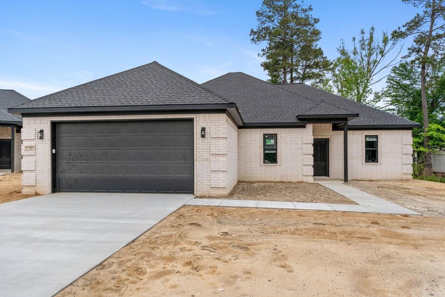 **$10K buyer credit—use it your way!** Welcome to Springtree Village Phase 5, a soon-to-be gated community offering peaceful, quiet living just minutes from town. This move-in ready new construction home features thoughtful finishes throughout, including tray ceilings, recessed lighting, granite countertops, ceiling fans with light kits, and architectural shingles. The garage is fully finished with sheetrock, paint, and an automatic opener for added convenience. Situated on a cul-de-sac in a growing new neighborhood, this home also includes a 1-year builder warranty for peace of mind. Lot size is estimated from the plat—buyers to verify measurements. Square footage is based on plans; buyers should measure. Taxes TBD. Some photos have been virtually staged. No seller property disclosure.