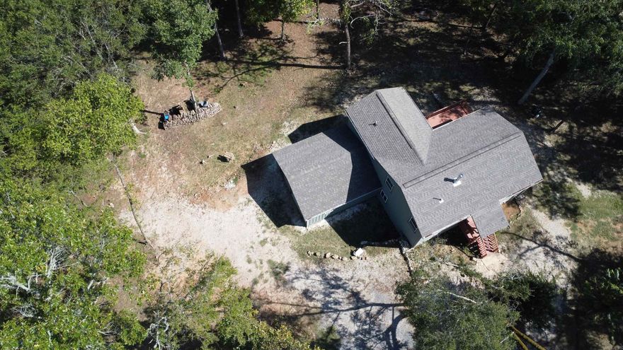 3 bedroom, 2 bath bordering Ouachita National Forest on the east. This custom built home has 1000 sq ft upstairs and 1000 sq ft in the basement with a 19x22 garage/workshop sitting on 4.26 acres. Located on the north side of Lake Ouachita in a retreat that has access to Irons Fork Creek. Exterior of the house has hardy board, architectural shingles, and 2 porches. There is a nice garden area, a creek, and partially wooded. Plenty of room inside with lots of natural lighting. Basement is perfect for the storm watchers, has the potential to be a game room/family room/office space/ or more bedrooms. Wood burning stove heats upstairs and down. Do not miss out on this one of a kind. Call today for an appointment.