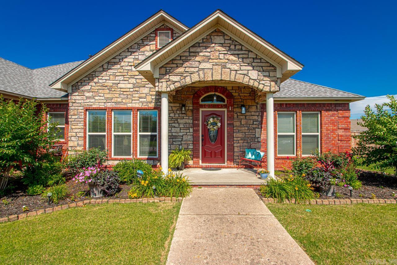 You must see this beautiful, well-maintained home in a wonderful subdivision. The wide-open spacious floor plan is perfect for entertaining. There are 3 bedrooms, 2 baths plus powder room, bonus/office/tv room. Jack and Jill bath between guest bedrooms. The rear covered porch was recently glassed in to create an inviting sun room that is heated and cooled. From the concrete pad with pergola, to the newly planted trees and lovely perennial bedding plants, you will love the landscaping the owner installed. The addition of a 16 X 10 metal storage/shop building is handy for the hobbyist or for storing landscape equipment. The garage features ample storage and an in-floor storm shelter with sliding door. Newly installed LVT flooring in main areas and primary. Carpet in guest rooms is newer and in great condition. The range in the kitchen was replaced in 2023. This home is special, so get it while you can!