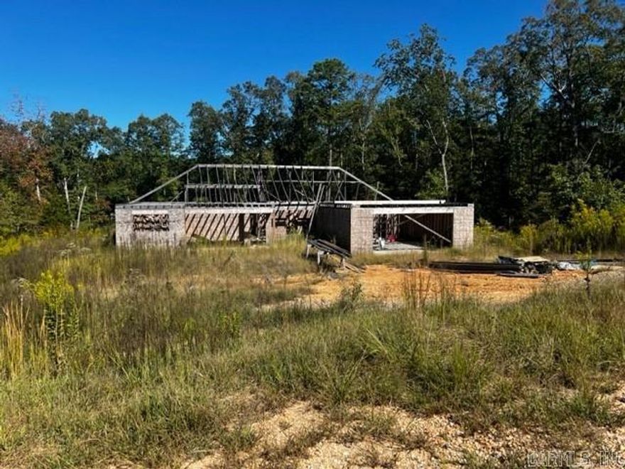 This unfinished 2022 construction on a 3.27 acre lot has the slab, plumbing roughed in and framed, offering an opportunity to bring your vision to life.  Property to be sold As-Is.  Title to convey via Special Warranty Deed.  Centennial does not require the purchaser to obtain financing, purchase insurance or any other bank product from Centennial as a condition of this contract.