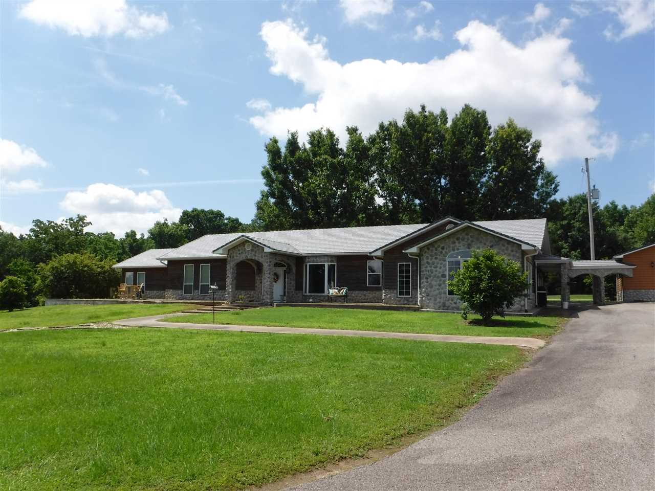 122 acres in Ola, AR is a mixed use residential, recreational, ranchland property. A 3574 Sq. Ft. ,built in 1999, 3 bd / 2 ba sits back off the Hwy on a small knoll providing excellent views and privacy from the highway road frontage. Two large living areas and a large rustic office area. Additional bedrooms could easily be added. With about a 50/50 split of woods and pasture, there is excellent opportunity for running cattle and horses as well as cutting considerable hay. Excellent hunting