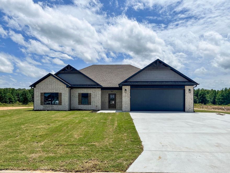 Welcome to your dream home! This brand-new construction has contemporary elegance & thoughtful design, offering the perfect blend of comfort and style. As you step inside, you're greeted by an expansive open floor plan that effortlessly combines the living and kitchen areas, creating a seamless flow for everyday living and entertaining. The heart of the home, the kitchen, features a sleek breakfast bar, corner pantry, custom cabinets, stainless steel appliances, & granite countertops. The living room is the epitome of relaxation, centered around a corner electric fireplace. This home offers four spacious bedrooms, providing ample space for the whole family or guests. The master bedroom is a true retreat, boasting a luxurious ensuite bathroom complete with a corner soaker tub, perfect for unwinding after a long day, and a separate walk-in shower.  And you will love the convenience of the laundry room being adjacent to the master bathroom!  Completion date is mid June!