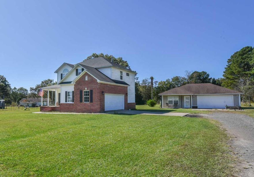 Need Extra living space for an in-law, teen, or the perfect man cave/she shed. Two units for the price of one! The separate outbuilding includes a 416 sq. ft. studio apartment, 3/4 bath, and 20 x 26 garage. Main house is 1700 sq. ft. 3 br 2 1/2 bath, open floor plan downstairs is great for entertaining. Dining Room full glass french doors lead to the deck and large backyard. See Agent Remarks.