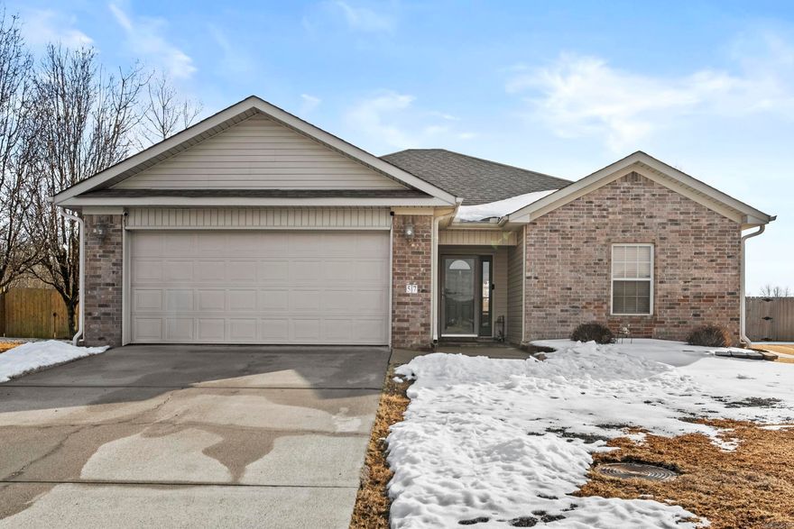 Enjoy peaceful lake views from this well maintained 3 bedroom 2 bath home with a desirable split floor plan.  Inside you will find brand new flooring throughout and a layout that offers both comfort and privacy.  Major updates include a new roof (2024), regularly serviced HVAC, replaced bathroom exhaust fans and a whole-home surge protector for added peace of mind.  Step outside to a large fully fenced backyard where re-routed gutters ensure proper drainage and functionality.  Whether relaxing indoors or taking in the water views this home blends thoughtful upgrades with everyday livability.  This home is eligible for !00% financing.