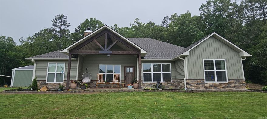 You won't find another property like this one! Over 40 acres, secluded, with creeks and 2 ponds! Home finished in 2021, with an second home (1983) and an art studio. Includes detached garage, shop and several carports. One of the ponds has a fishing dock and is stocked with fish! Also pasture land, so you can have some livestock or hay. The house has a back patio with ceiling fan and views galore! Beautiful landscaping and stone pathways. Automatic generator, so your comfort is a priority. Primary bedroom is one entire end of the house, and features a  custom shower and separate tub. Home is designed with an open floor plan, kitchen bar, coffee area, lots of counter tops and storage. Separate pantry, with lots of shelving. 2nd home has 2 bedrooms, 1 bath, kitchen area, outside patio, metal roof and is ready for occupancy. It is built semi-underground, with cinder blocks, so it's sturdy and protected. Views from the hill above the property are unmatched. The creeks, woods and pasture make this a showplace like no other!