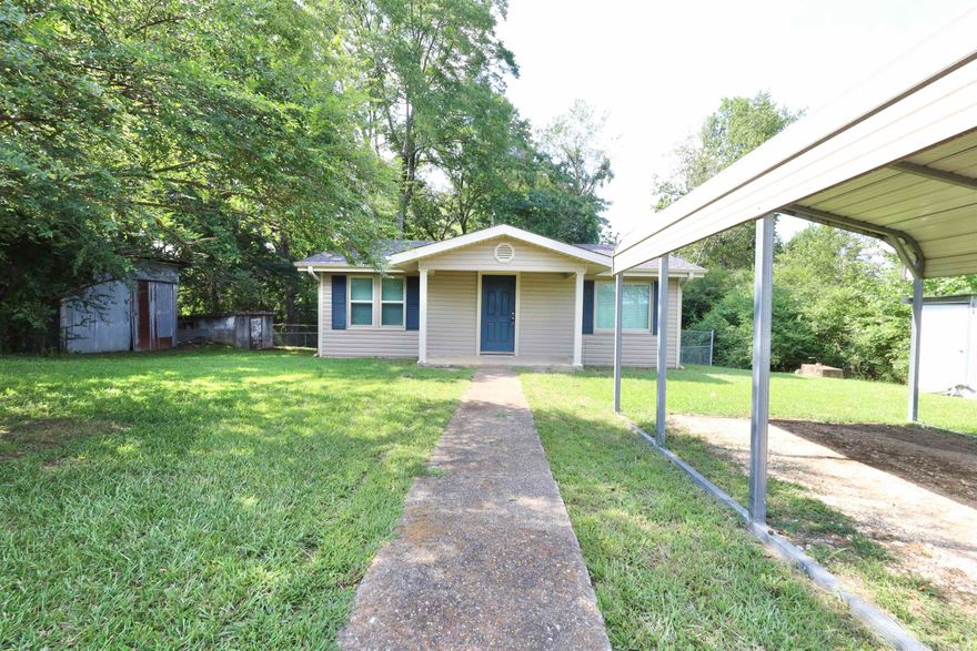 Charming and affordable 2-bedroom, 1-bath home perfect as a residence or investment opportunity. This property features a secure chain link fenced backyard, two storage buildings, and a carport. With prime Highway 70 frontage, it's conveniently located just 2 miles from Star of the West and Lake Greeson. Don't miss this opportunity!