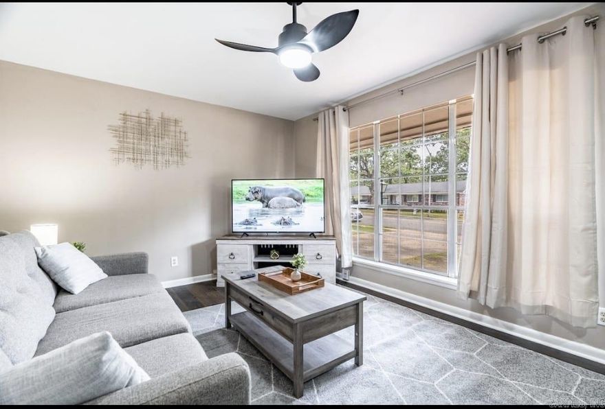 Spacious and stylish 3 bedroom fully fenced home with a 55 inch and 50 inch Smart TVs in the living room and master as well as Smart TVs in the other two bedrooms as well!