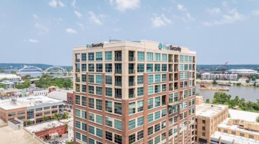 Experience refined downtown living in this unique French Country-inspired high-rise condo in the heart of the River Market District. This beautifully updated east-facing unit offers breathtaking views of the Arkansas River, Riverfront Amphitheater, and Clinton Presidential Library—enjoy concerts from your private balcony.  This 1-bedroom, 1.5-bath condo features fully remodeled bathrooms with new tile flooring, fresh paint throughout, new lighting, and new light switches. The updated kitchen includes new countertops, backsplash, sink, upper cabinets, stove, refrigerator, and dishwasher. Existing cabinetry has also been freshly painted for a clean, modern look.  Enjoy walkable access to downtown restaurants, entertainment, and attractions. Building amenities include a full-service hotel, Starbucks, bar, executive meeting space, gated parking, and FOB-only access with five layers of security. One dedicated parking space included plus nearby guest parking.