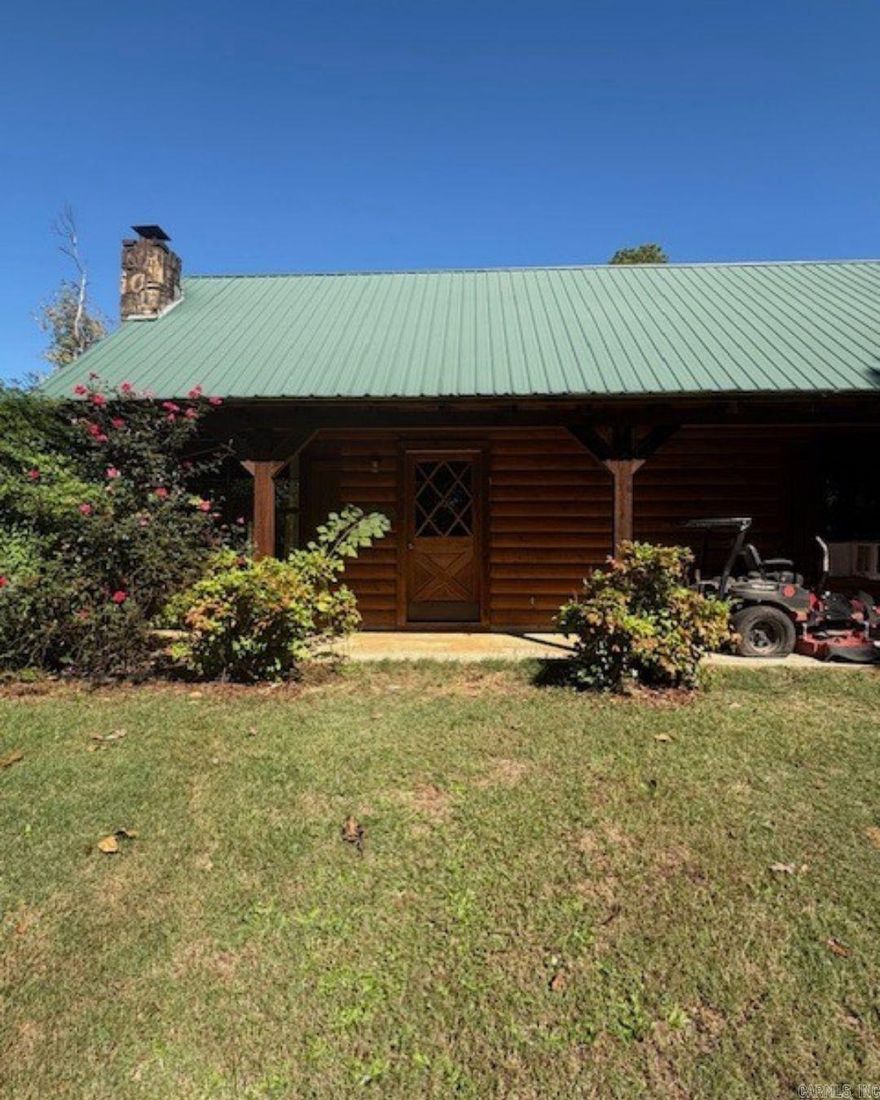 This true log home is ready for its next owner! With a little TLC and your personal touch, it can become a wonderful full-time residence or weekend getaway. Located just 2 miles from Lake Greeson and a short drive to Albert Pike Recreation Area, you’ll find yourself surrounded by the beauty of the foothills of the Ouachita Mountains. Outdoor and recreational opportunities abound in every direction. Enjoy plenty of porch space to take in the scenic surroundings of this charming log home.