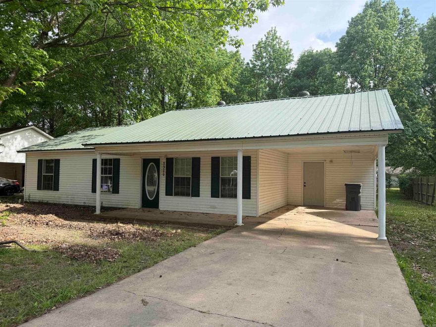 3 bedroom, 2 bath vinyl sided home with carport and 1316 sq ft.  New metal roof in 2021.  Partially fenced shaded lot. Shown by appointment only! This property is also listed as part of a package - See MLS #26016551. See agent remarks.