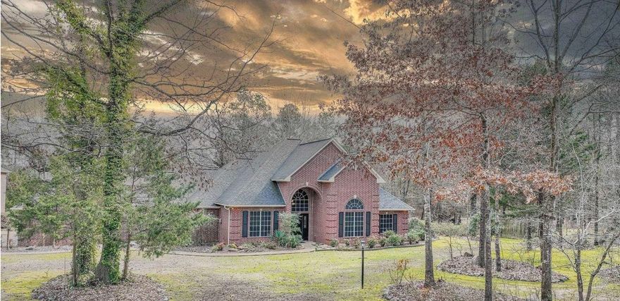 Don't miss out on this stunning property that is secluded on all sides in Texarkana, Arkansas outside city limits nestled on 4.7 acres. Featuring 3 bedrooms and 3.5 baths. It offers plenty of space for comfortable living. The large kitchen has a big island, pantry, and lots of cabinets making it perfect for anyone who loves to cook or entertain. The tall ceilings and fireplace in the living room create a cozy and inviting atmosphere. The formal dining area and breakfast nook provide options for enjoying meals with family and friends. Luxurious master suite, bathroom with separate vanities, his and hers walk-in closets for ample space. The three-car garage is perfect for parking vehicles and additional storage. The detached garage has room for that boat, atv or extra car along with a full bath. Upstairs bonus room that is 672 sqft heated and cooled, can be used as a man cave, office, or any other flexible space that suits your needs. The oversized covered back porch is a great spot to entertain your guest or just relax and enjoy the outdoors. Large workshop outback is excellent for pursuing hobbies or DIY projects. This property offers both space and a great location. It's a beautif