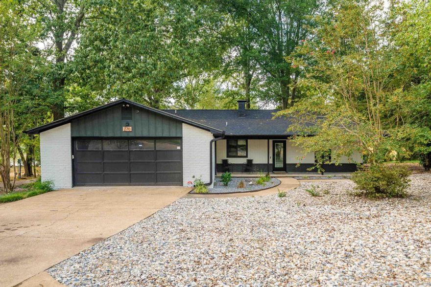 This beautifully updated home offers lakefront living at its finest, featuring an open concept layout, a covered boat dock, and modern upgrades, including a new roof, HVAC, and state of the art appliances. The neighborhood includes a private boat ramp, adding even more convenience. Enjoy outdoor living with a spacious deck, patio, and a 19x9 storage building, perfect for storing lake toys, kayaks, or outdoor gear. Conveniently located 5 minutes from the MLK bypass, 6 minutes from Lakeside schools, and 10 minutes from Bathouse Row, this property is close to shopping and dining. Currently a short term rental, it's available fully furnished with high end contents. *Entergy approved permit do dredge the lake 2 feet.*  Call today to see this turnkey lakefront retreat!